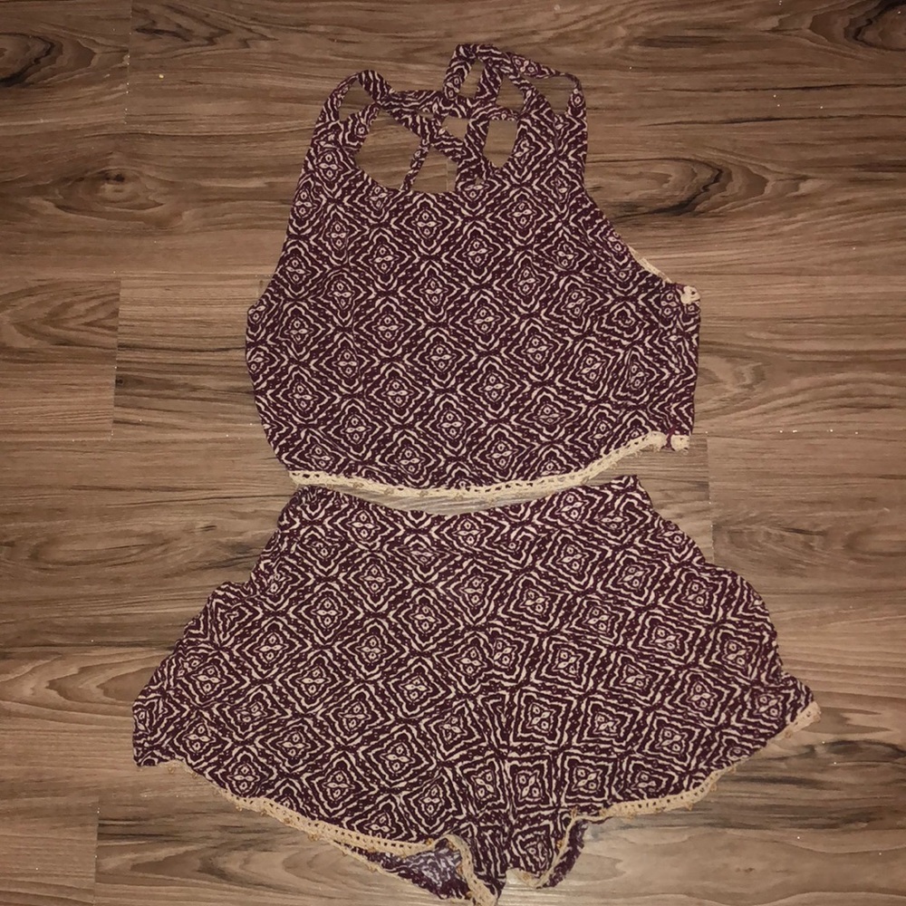 Maroon romper with beading